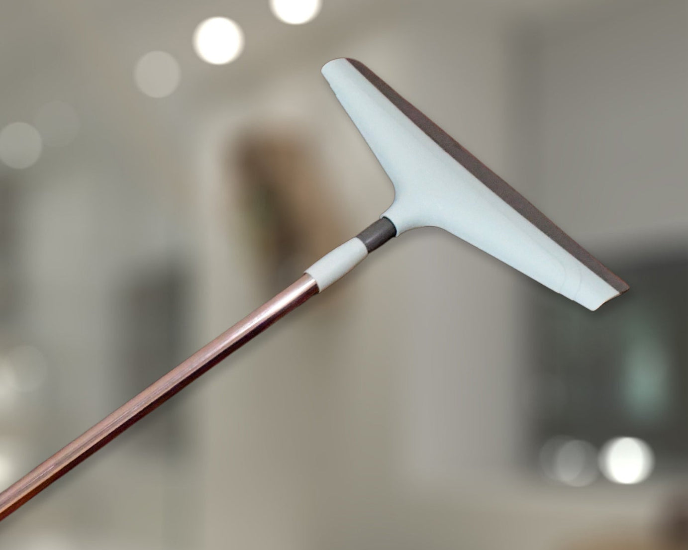 Telescopic floor wiper by Ganesh, 16 inch (40 cm), different angles and perspectives.