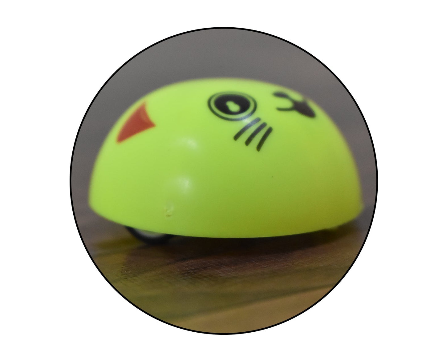 Pull back toy with smiley face