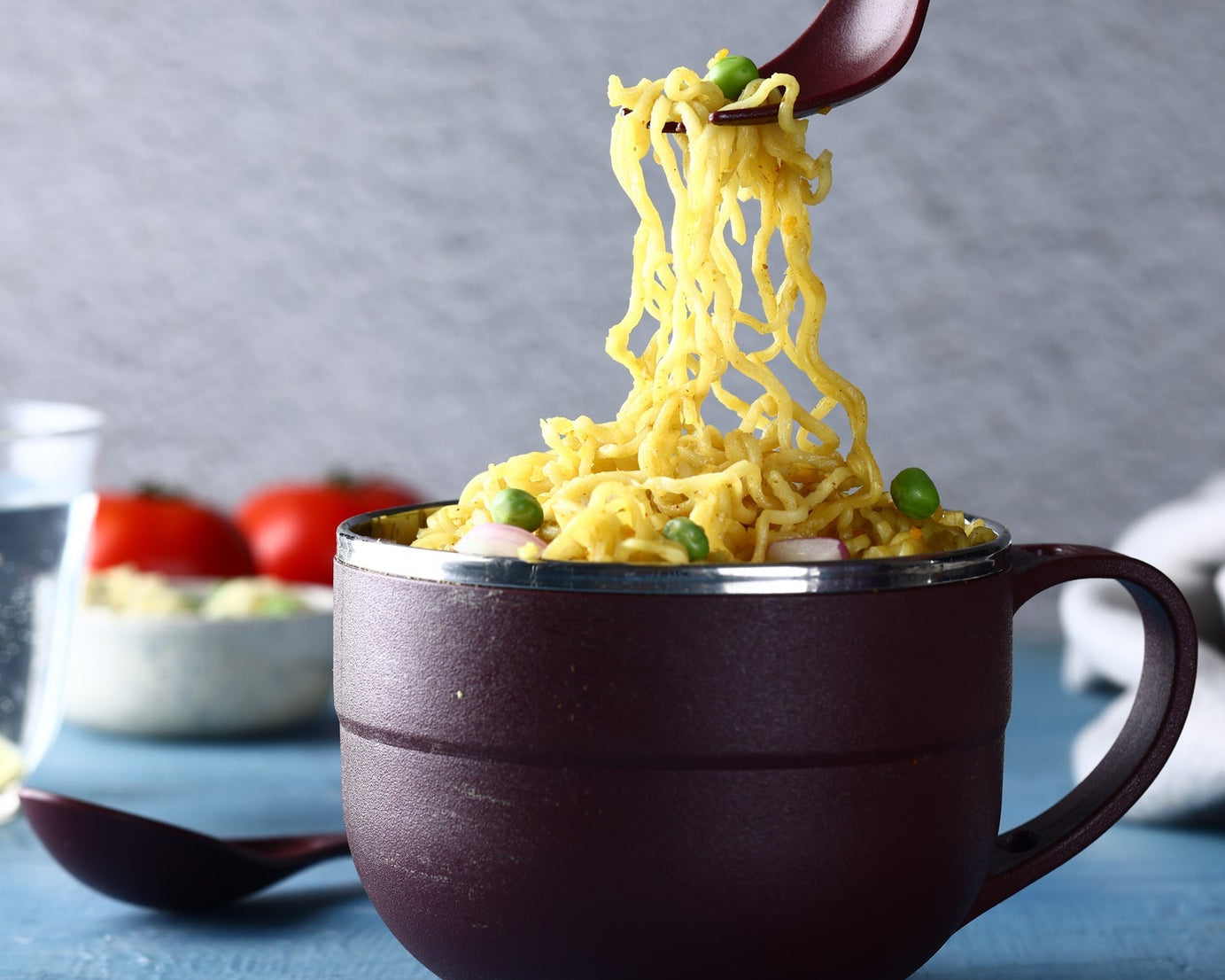 Stainless steel bowl with lid and spoon for versatile kitchen use