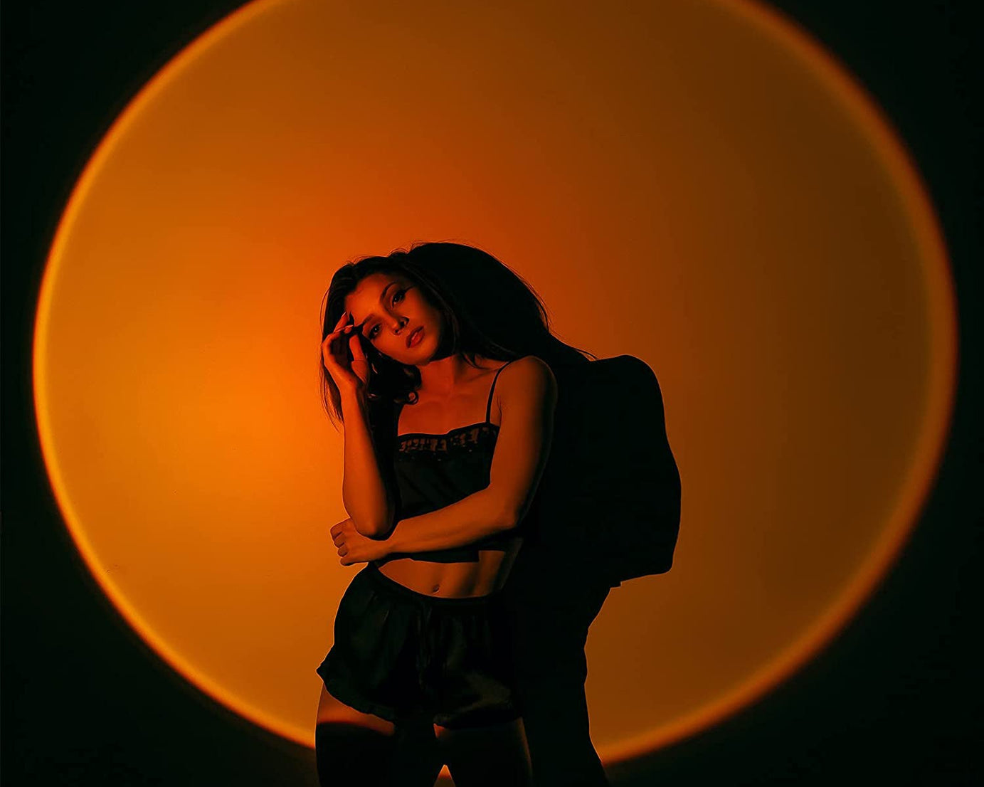 Four colors LED sunset projection lamp, night light, shown from different angles.