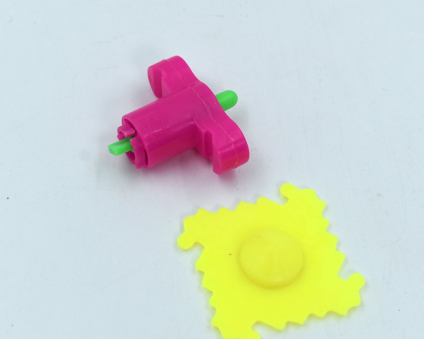 Toy spinner with launch feature