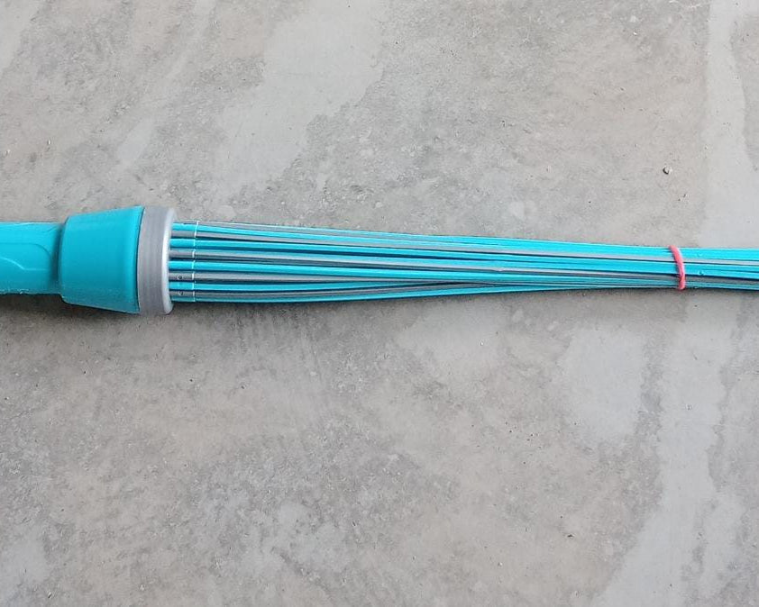 Plastic broom for cleaning, showing bristles and base