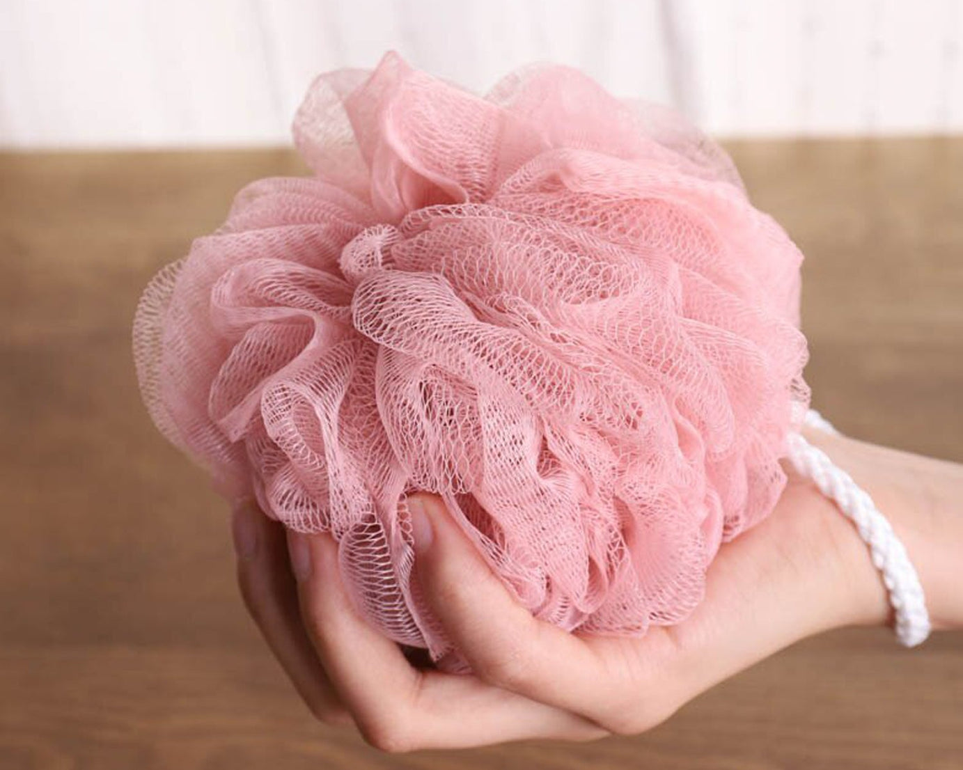 Back scrubber with loofah sponge for body care
