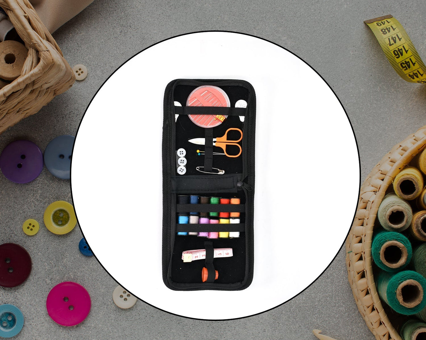 Sewing set with thread spools and needles