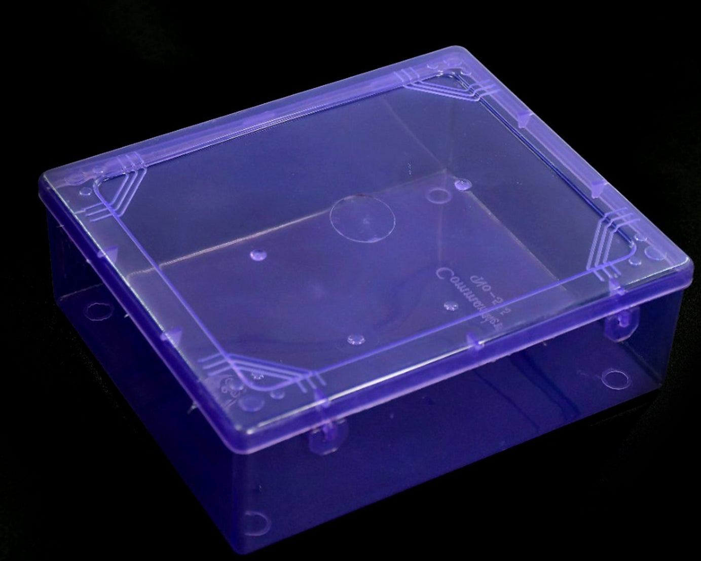 Clear plastic storage container with secure lid, ideal for organizing household items, clothes, and more.