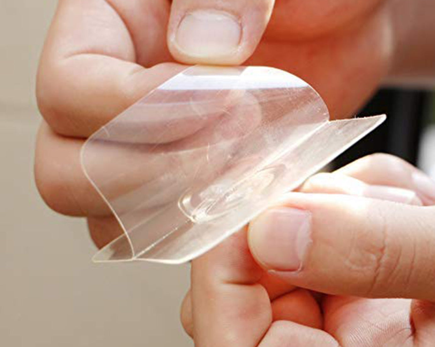 Adhesive wall hook for home and office organization