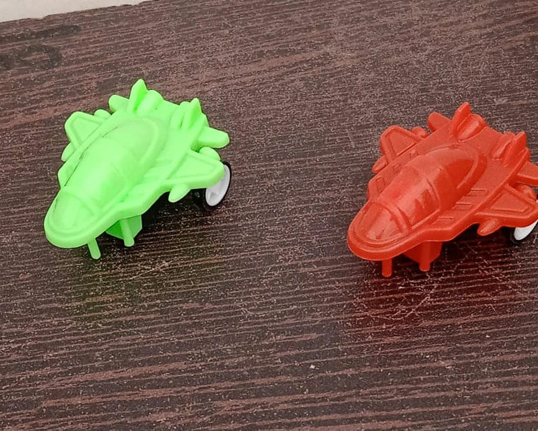 Small pull back plane toy