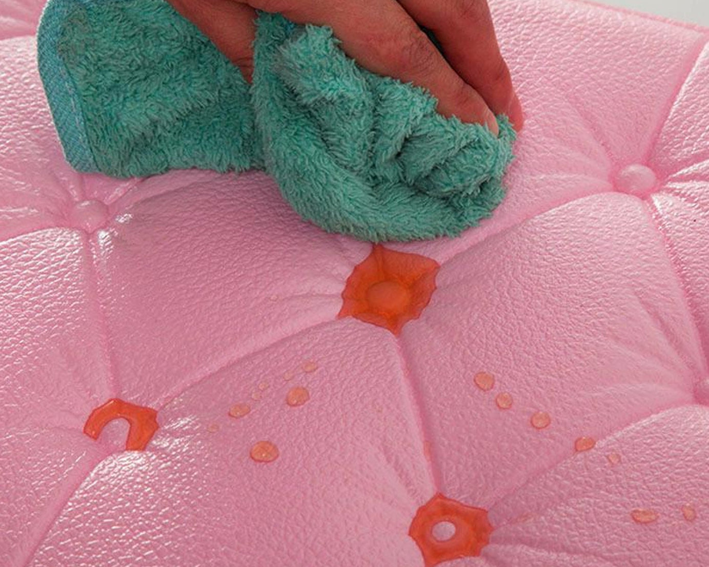 Brown textured 3D wall cushion.