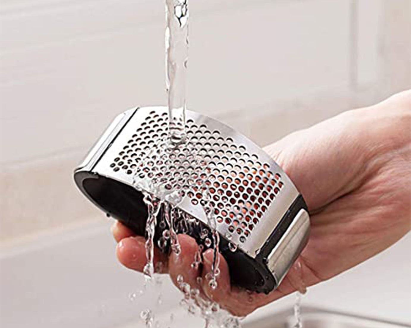 Garlic press with cloves