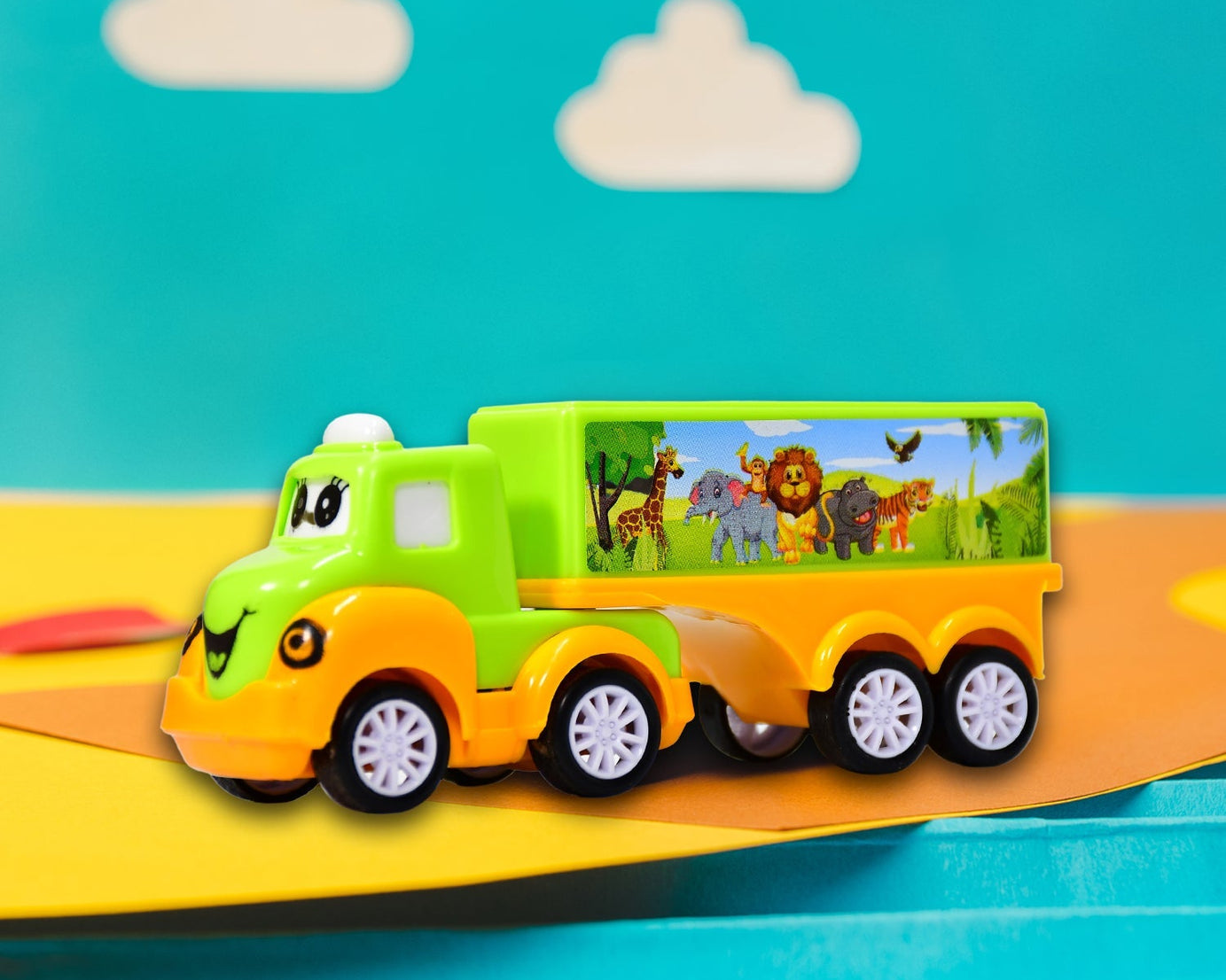 Small toy truck in green and yellow color