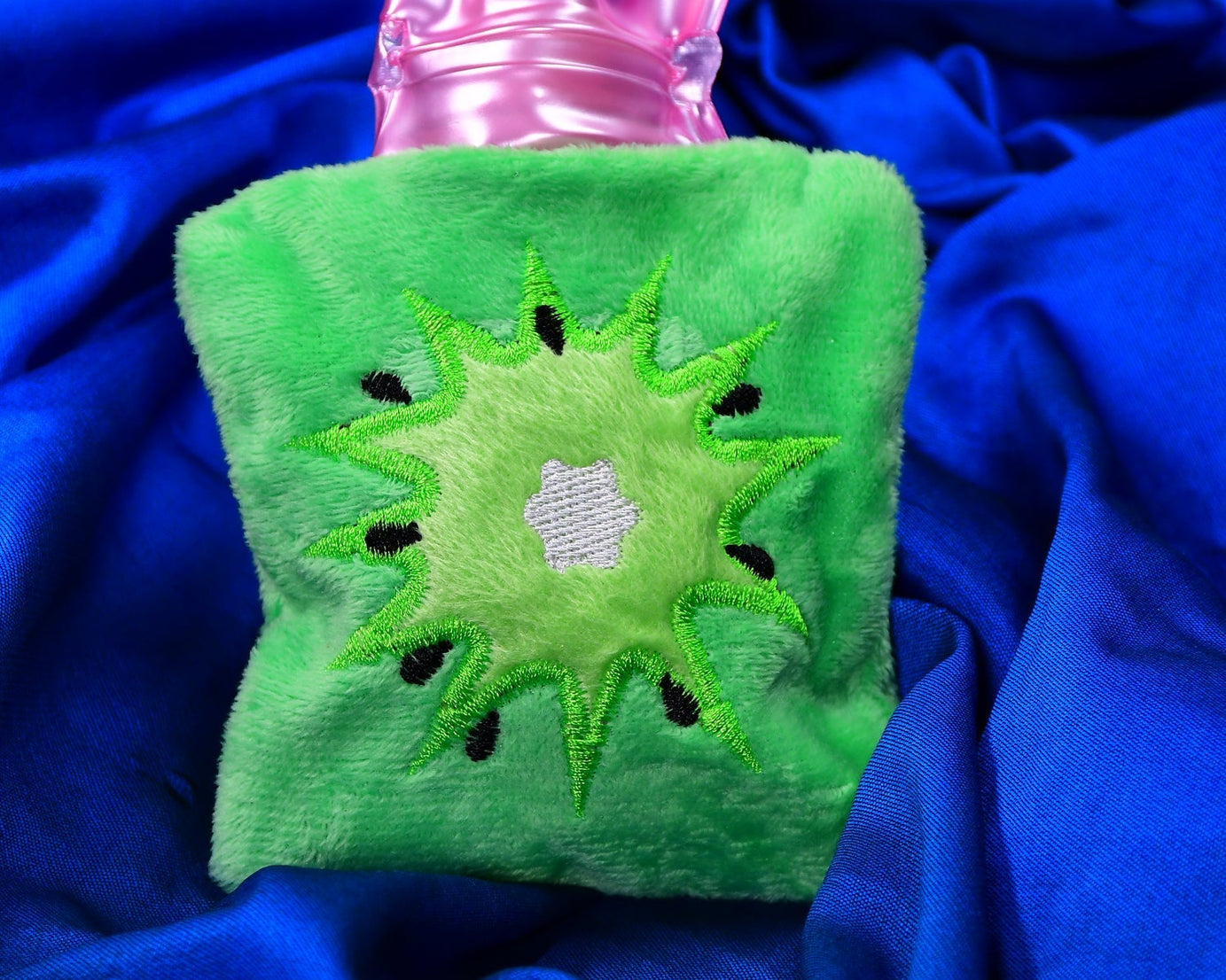 Hot water bag in green sun design, ideal for relieving neck and shoulder pain