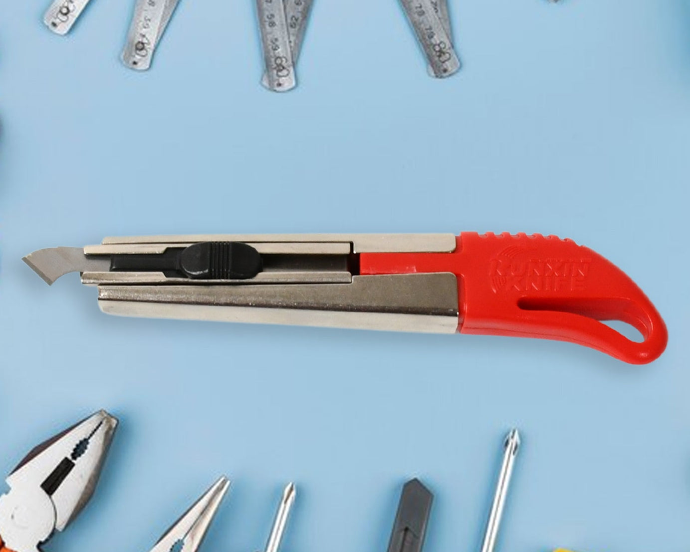 Multi-use plastic cutter with interchangeable cutting blades