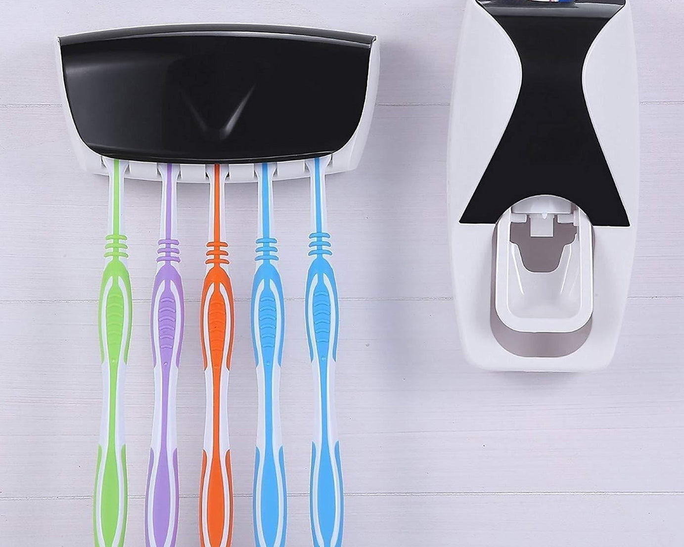 Toothbrush holder with toothpaste dispenser