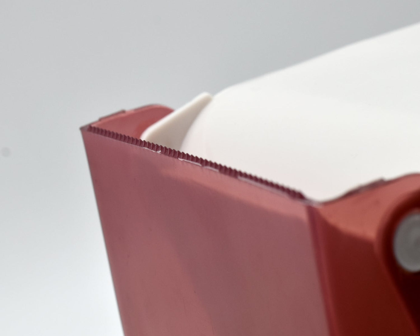 Tissue holder with a simple design for effective use in home settings