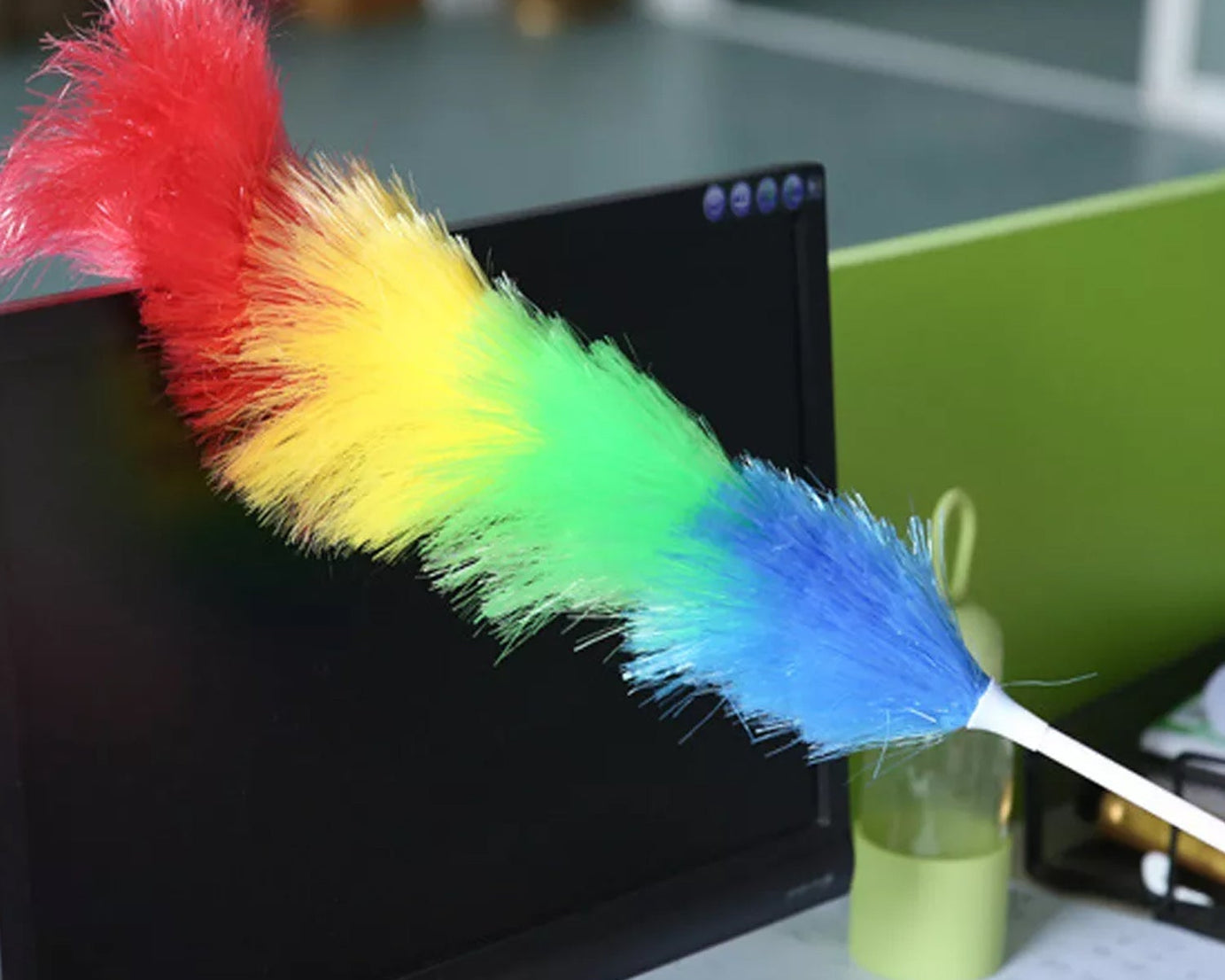 Microfiber dusting stick with colorful feathers