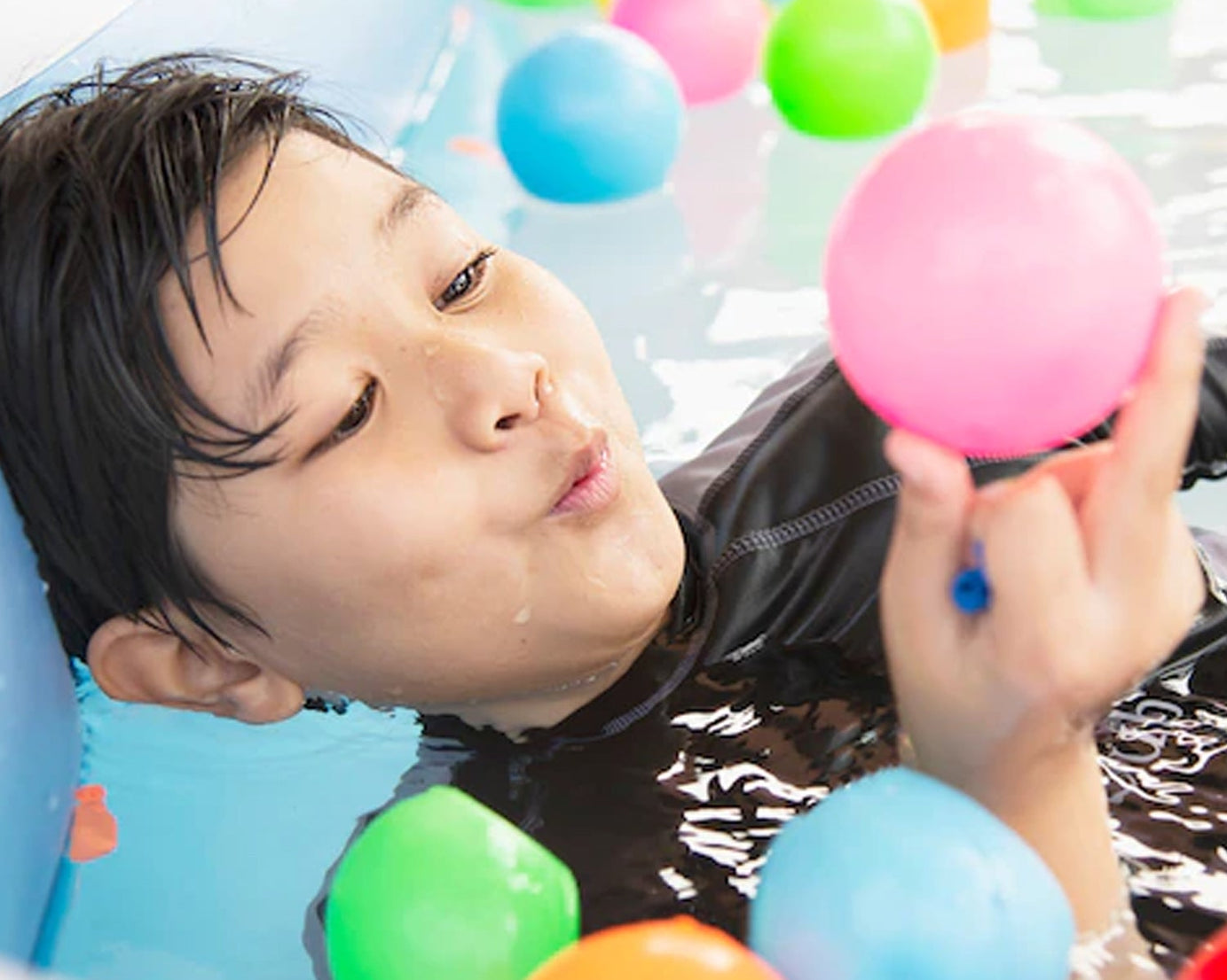 Assorted multicolour balls for indoor and outdoor play.