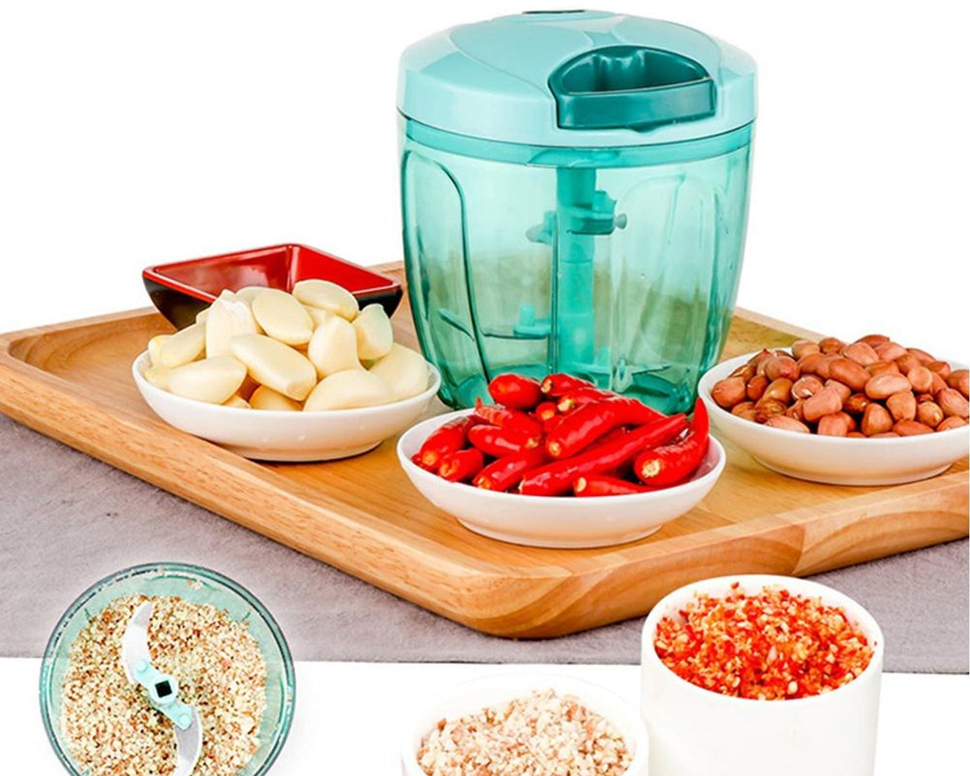 Handheld vegetable chopper with five stainless steel blades and a 750 ml container