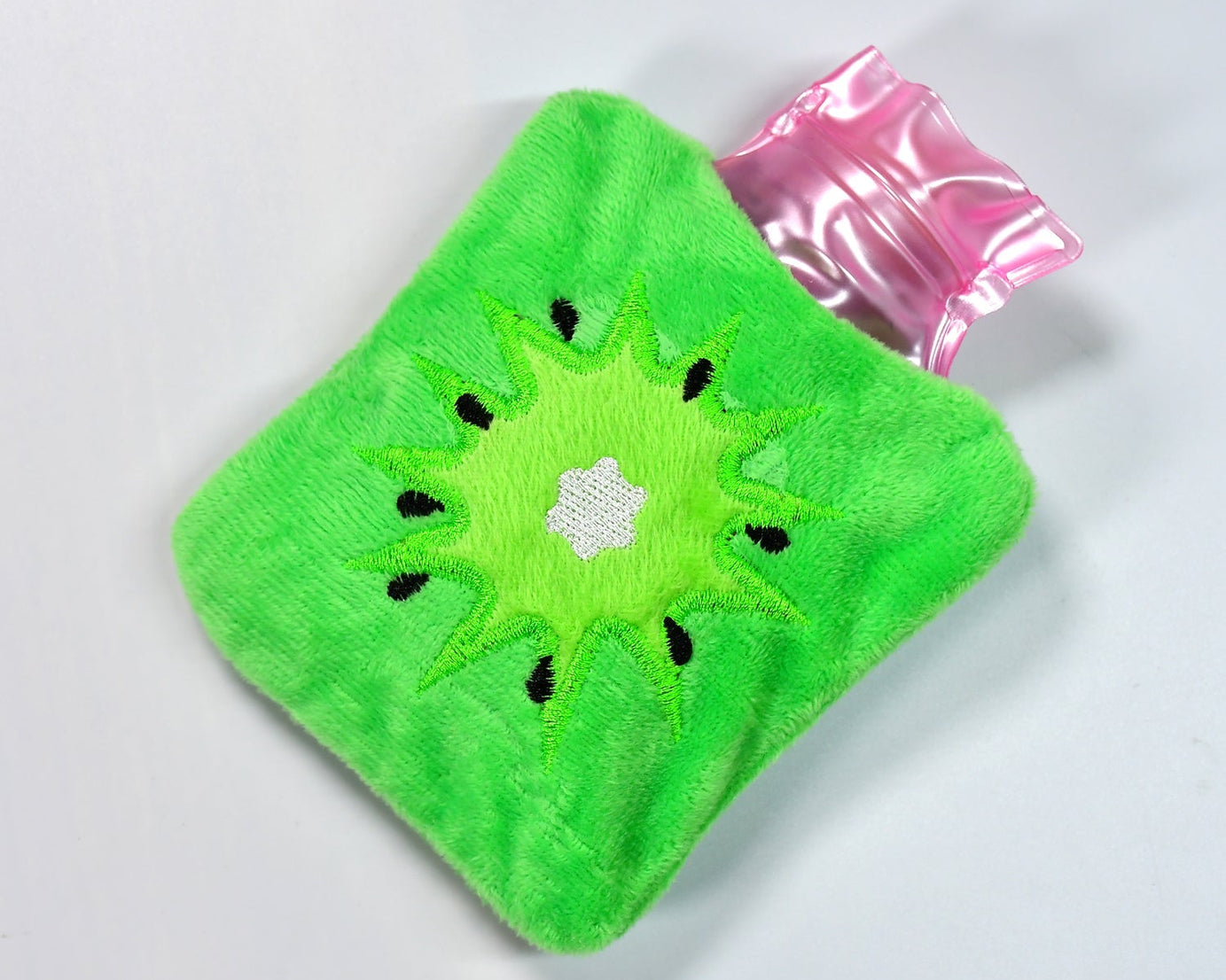 Green hot water bag with sun design for relieving menstrual cramps