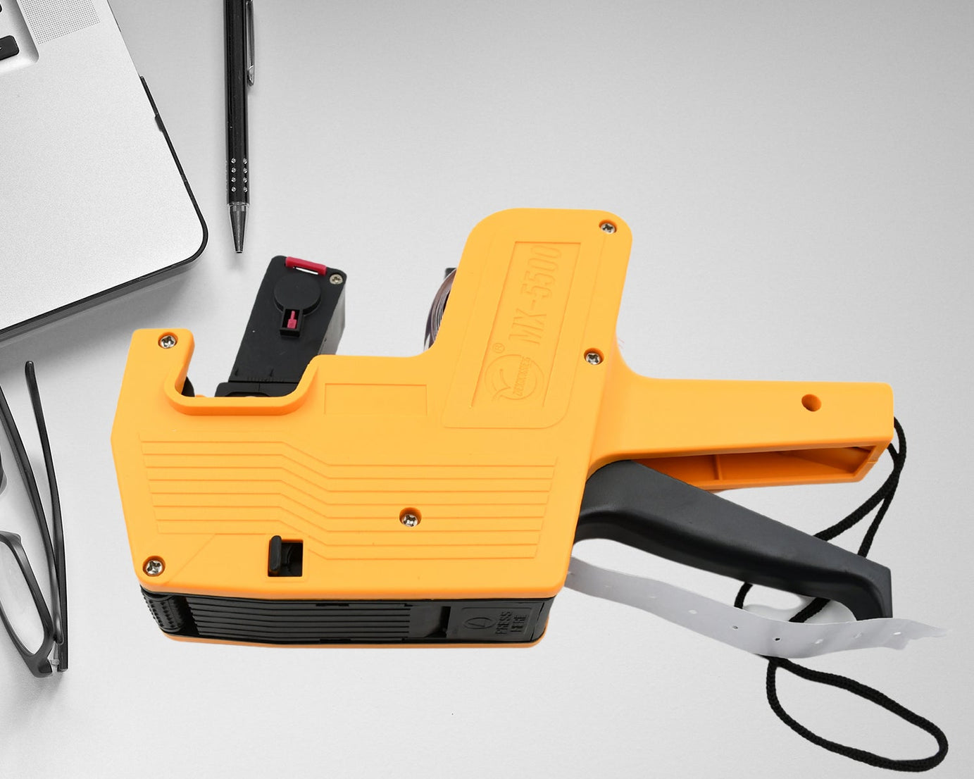 HAND HELD PLASTIC 8 DIGITS PRICE LABEL TAG GUN WIDELY USED IN DEPARTMENTAL STORES AND MARKETS FOR PRICE TAGGING AMONG CUSTOMERS.