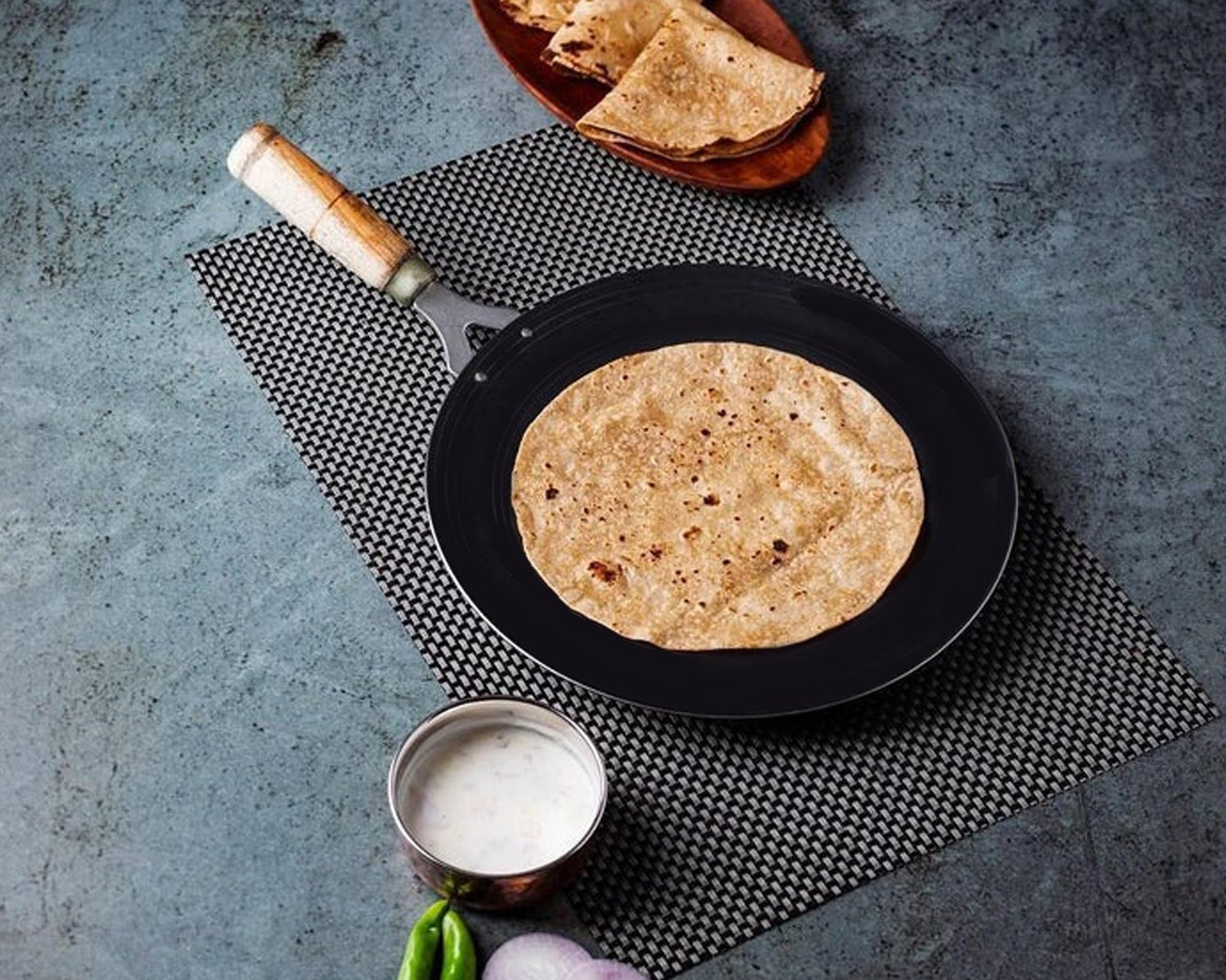 Nonstick wooden handle roti tawa, ideal for everyday cooking of rotis.