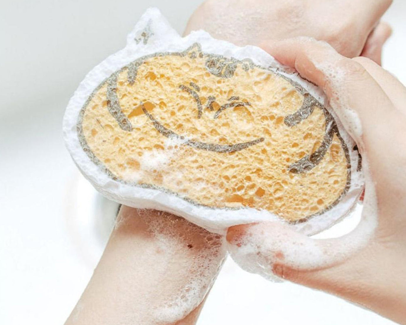 Scouring pad with cartoon design