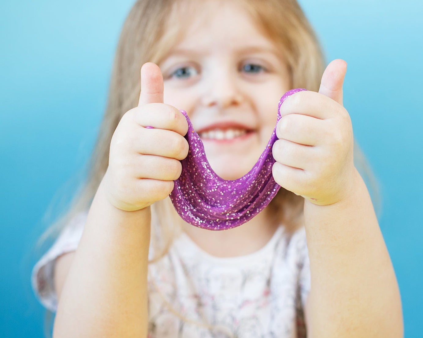 Combo of glitter and crystal slime in a jar for creative play