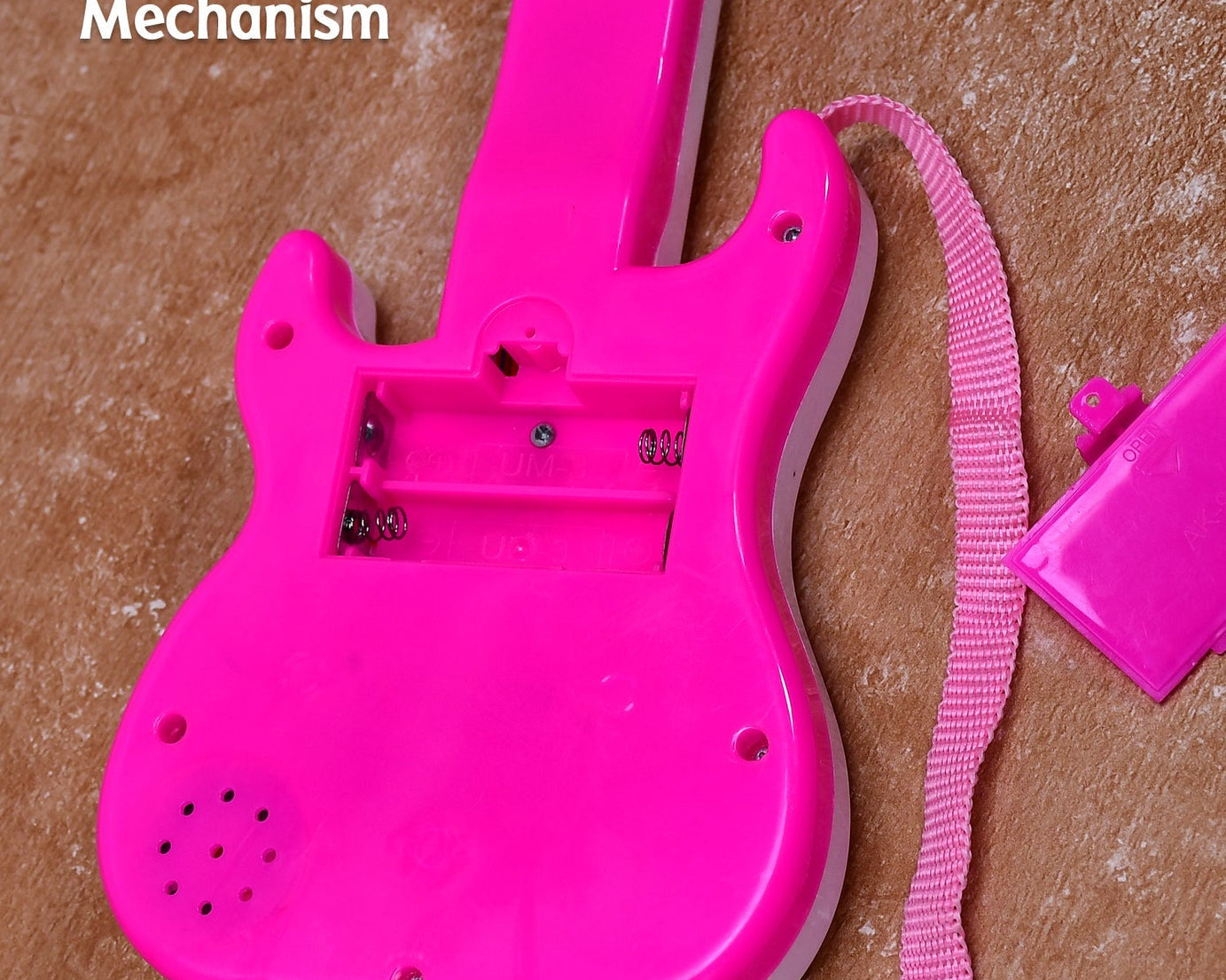 Bright mini guitar toy for kids aged 3+.