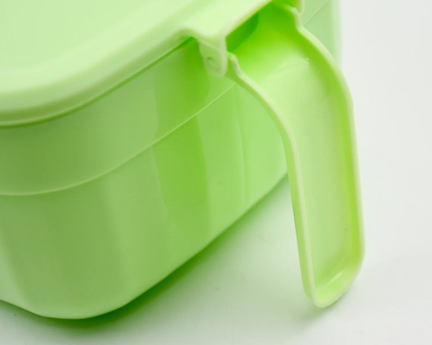 Masala box with four sections, ideal for keeping various spices organized.