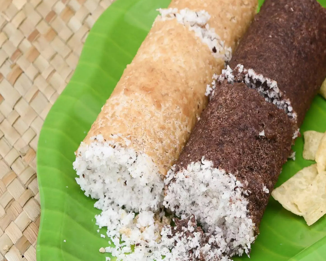 Black handle and metal steamer for making puttu