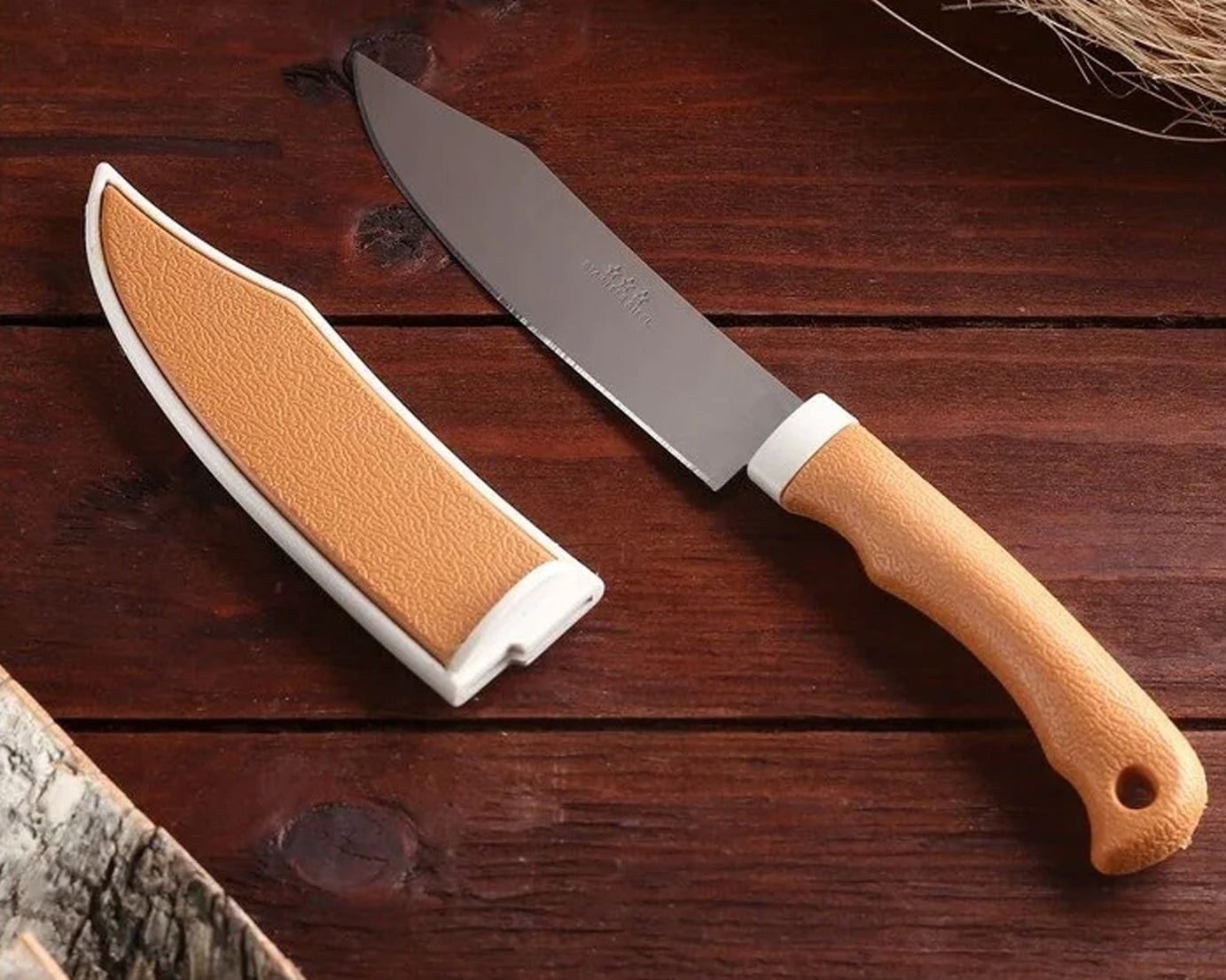 Kitchen knife with cover and sharp blade.