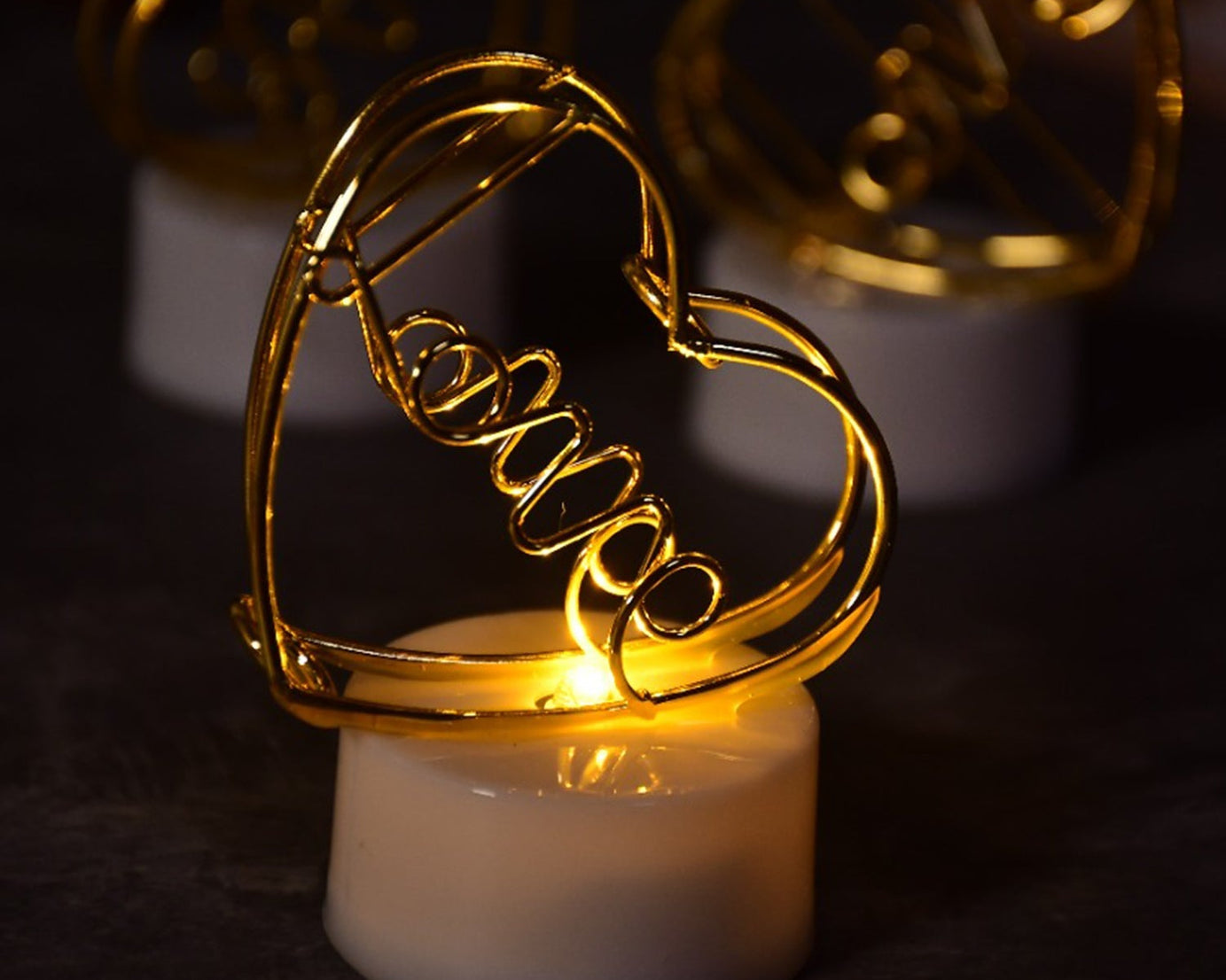 Multicolor flameless heart candles for decor.