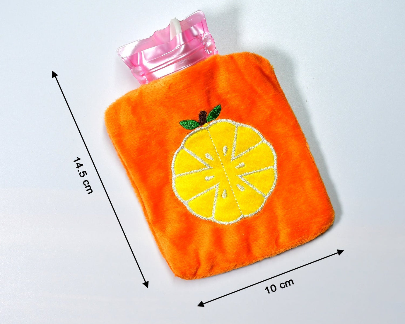 Hot water bag in orange with cover for pain relief