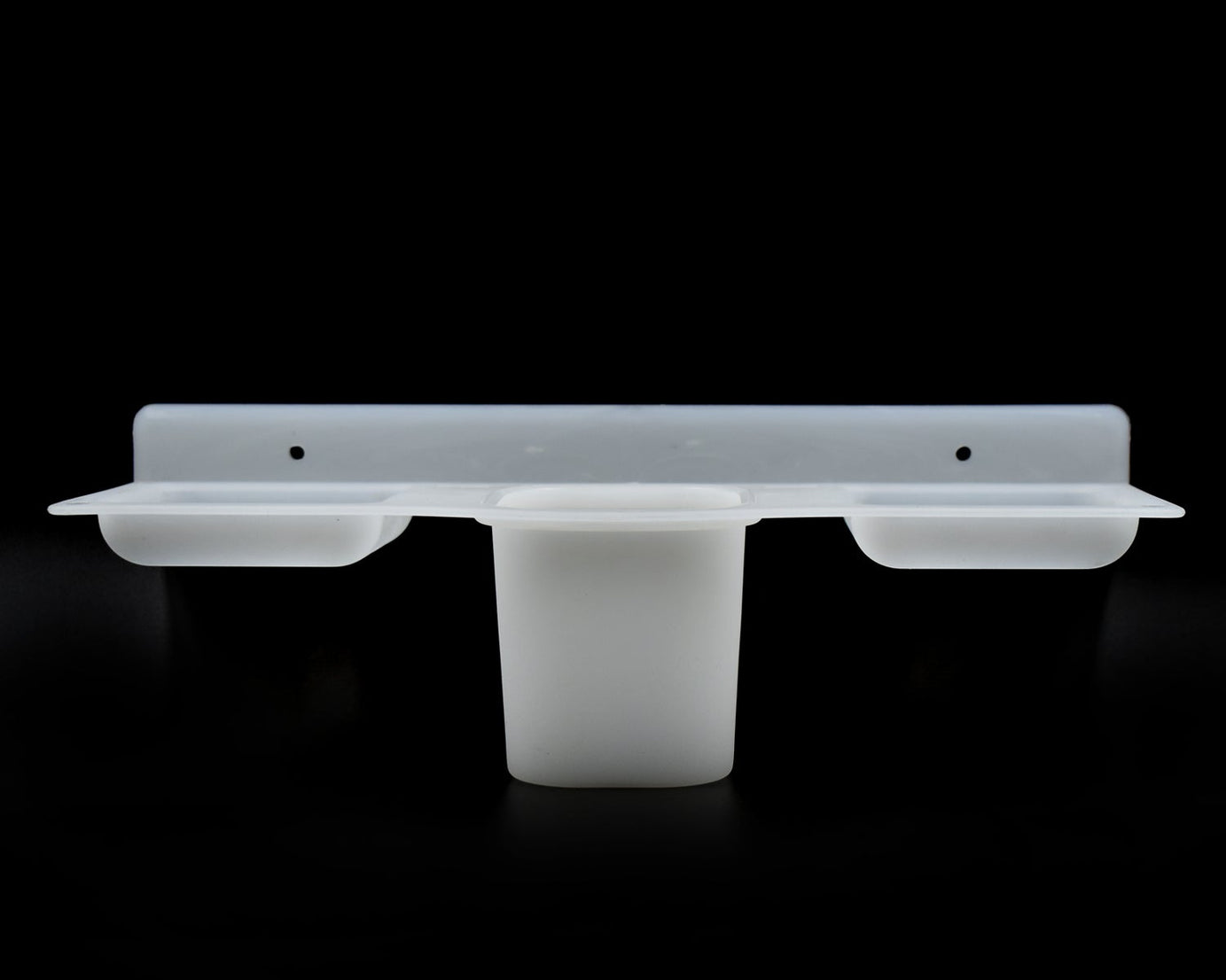 Plastic soap dish and tray with functional design for efficient soap storage.