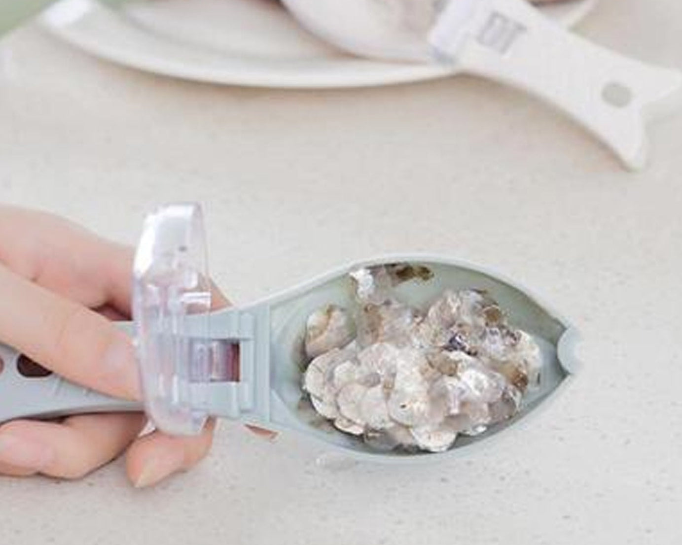 Kitchen tool for cleaning fish scales with ease.