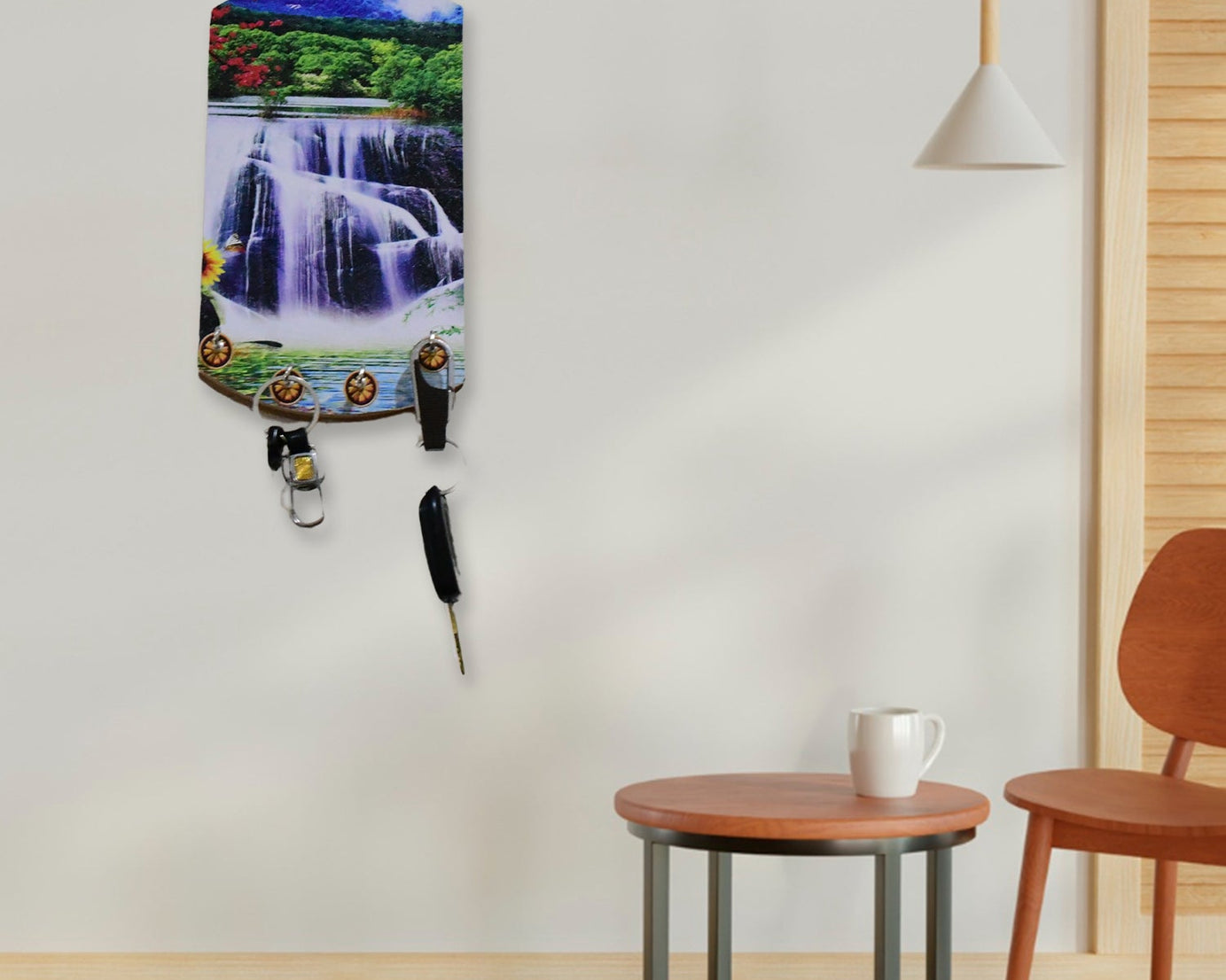 Wooden wall decor with scenic vertical design and hanging hooks.