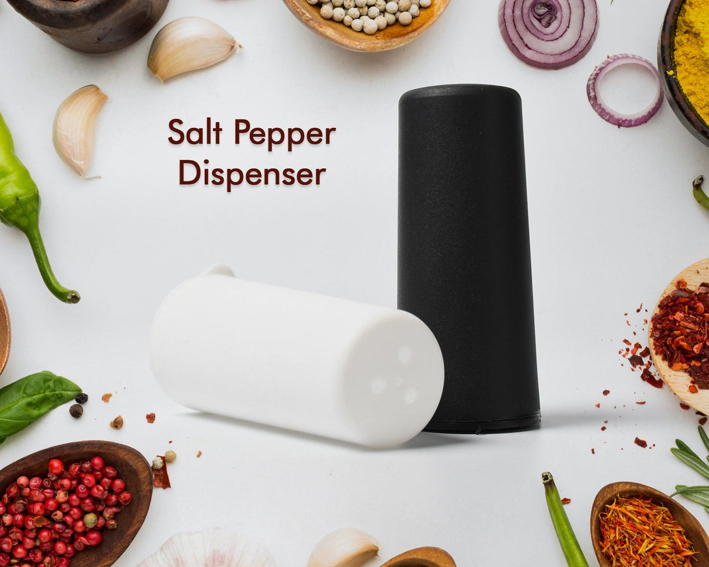 Salt and pepper dispensers on table