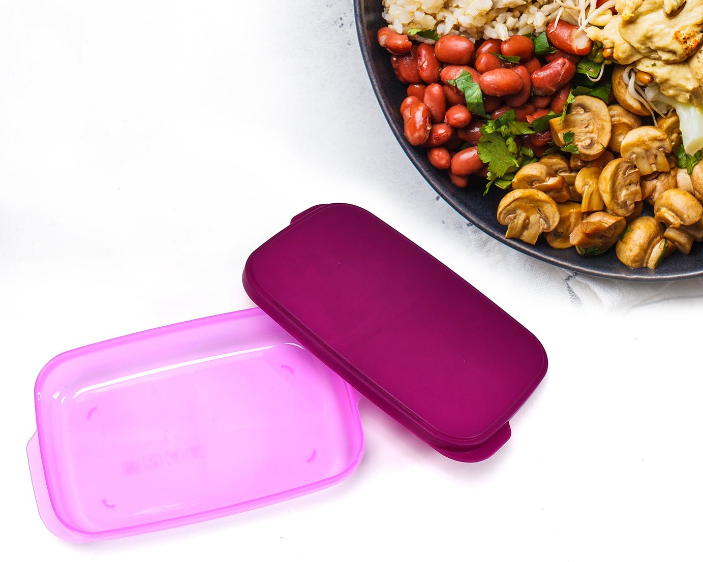 Easy-to-clean plastic lunch box with multiple compartments.