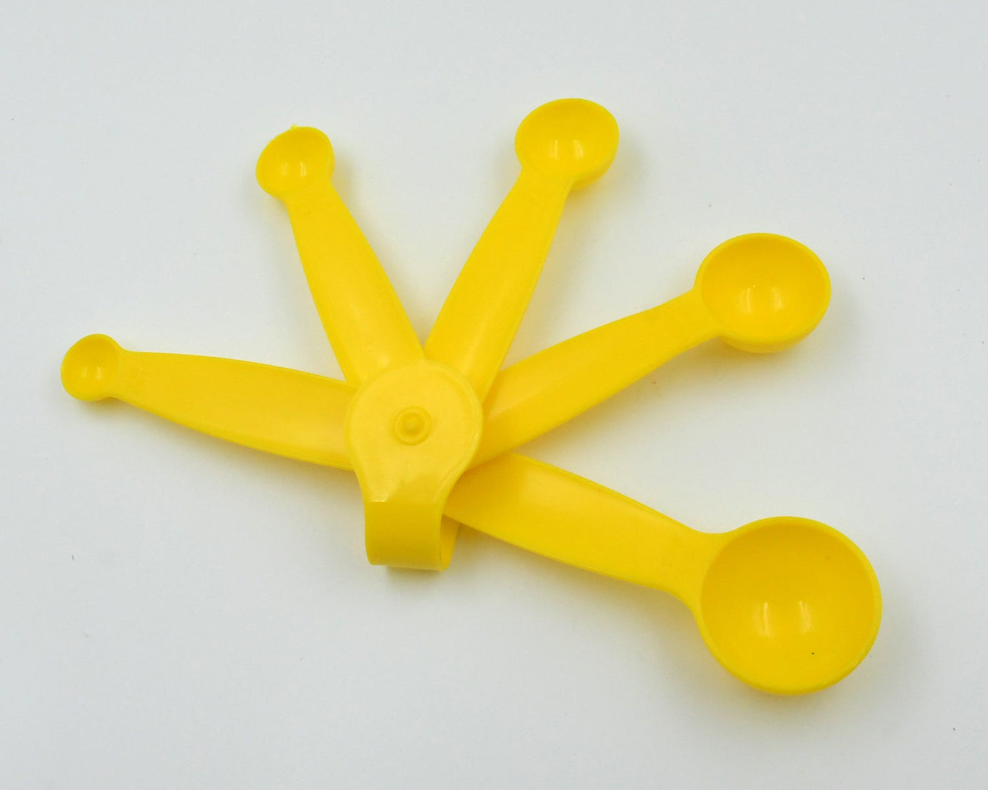 Measuring spoons set in plastic