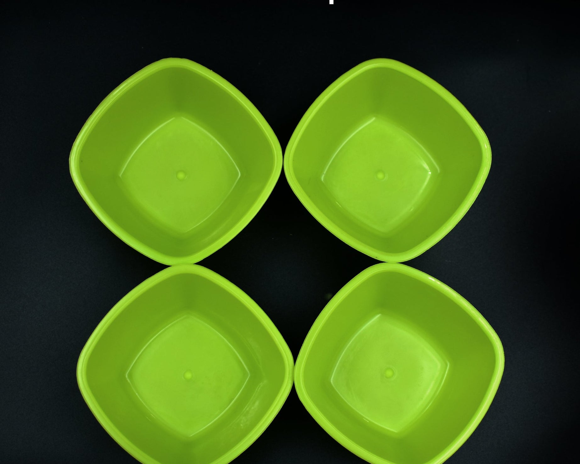 Unbreakable plastic bowls, square design.