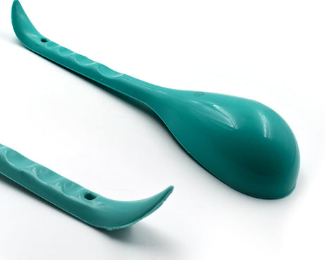 Plastic serving spoon for easy use.
