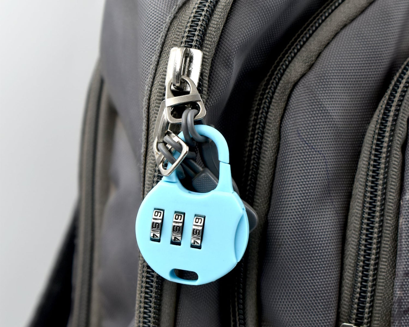 3 digit zipper lock used for securing zipper closures with a combination locking mechanism