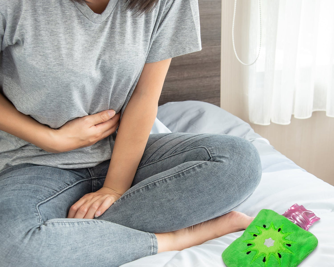 Green sun hot water bag for warmth and relief from body aches