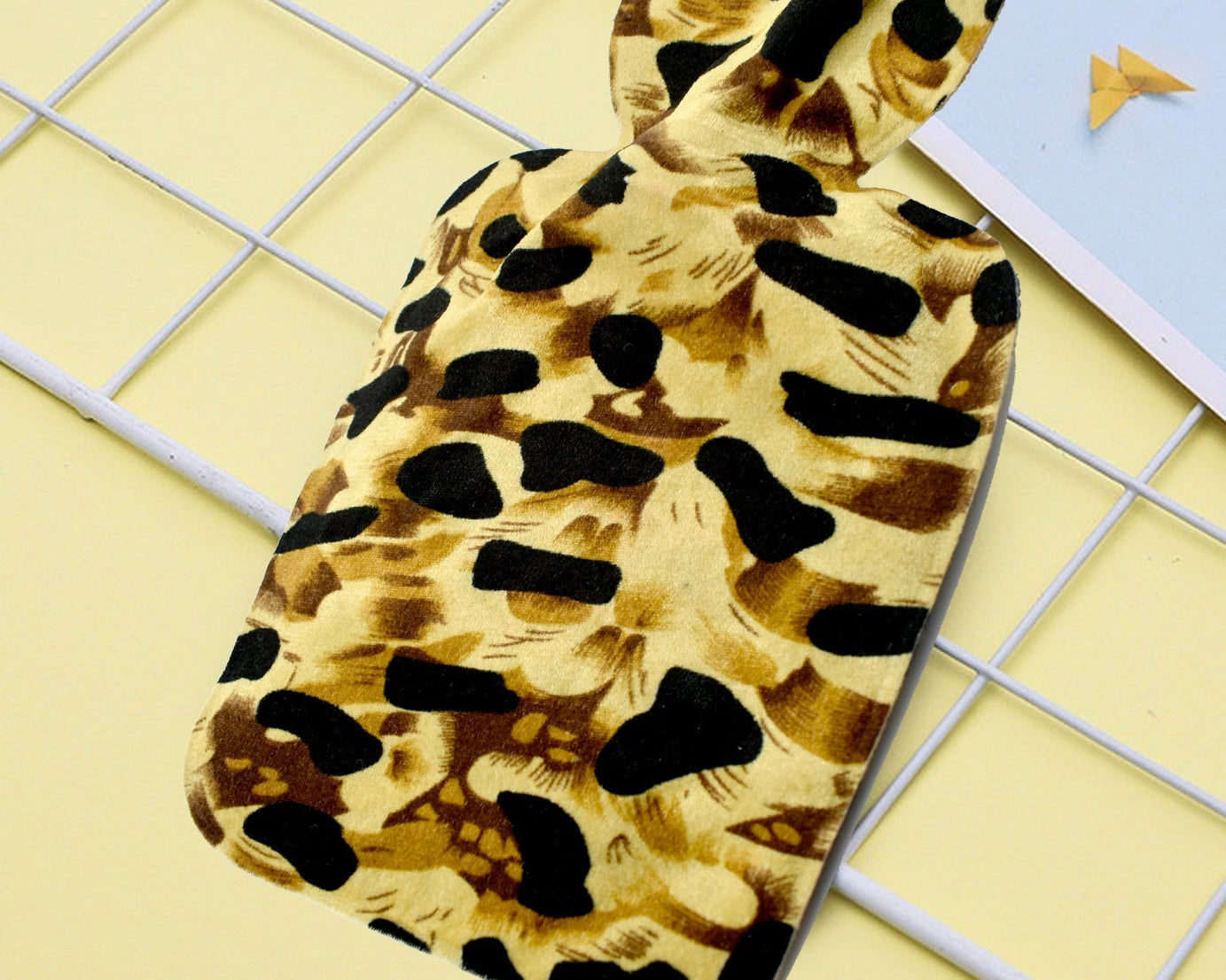 Large rubber heating pad bag placed on a surface, emphasizing its size and usability
