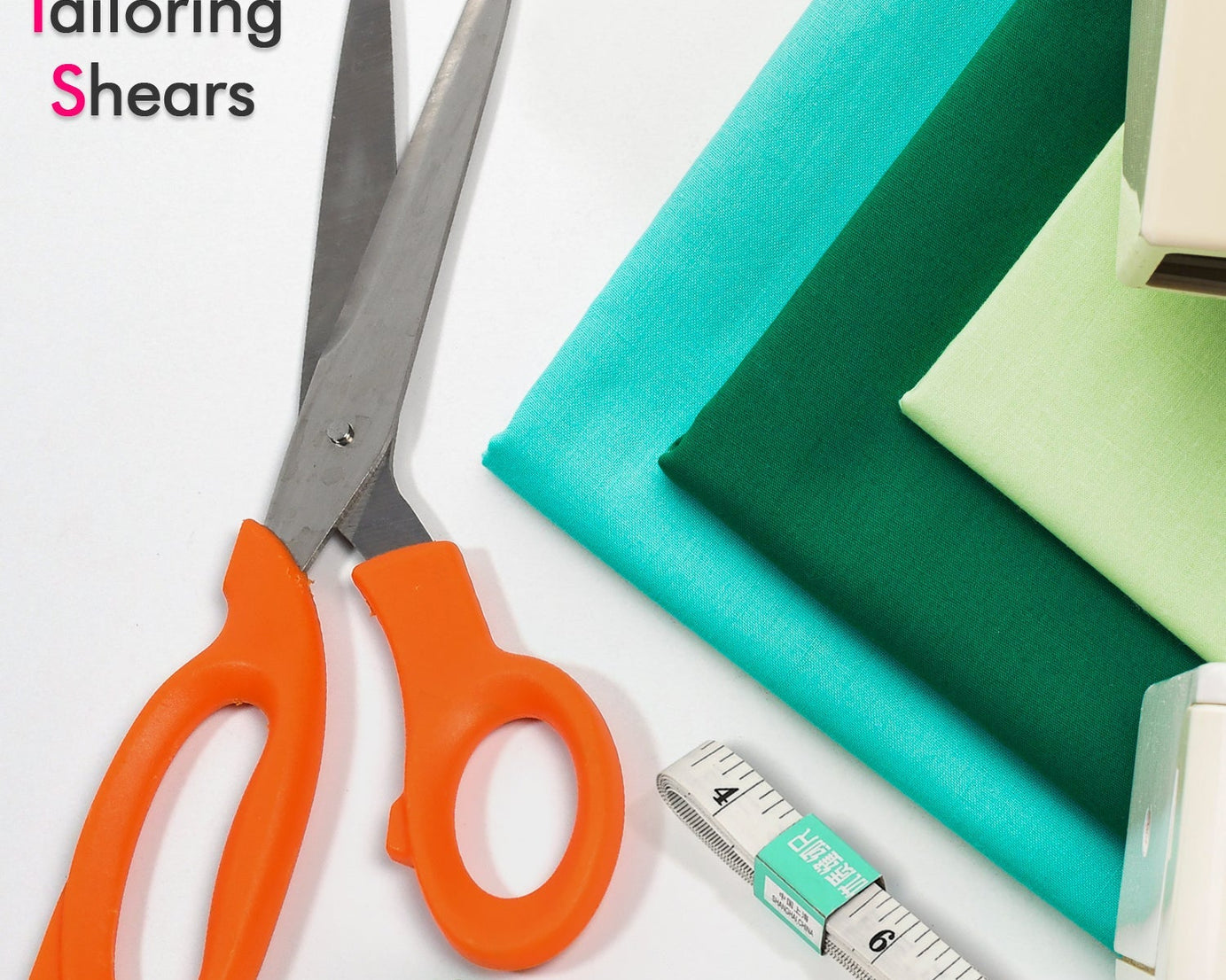 Scissors with built-in measuring tape