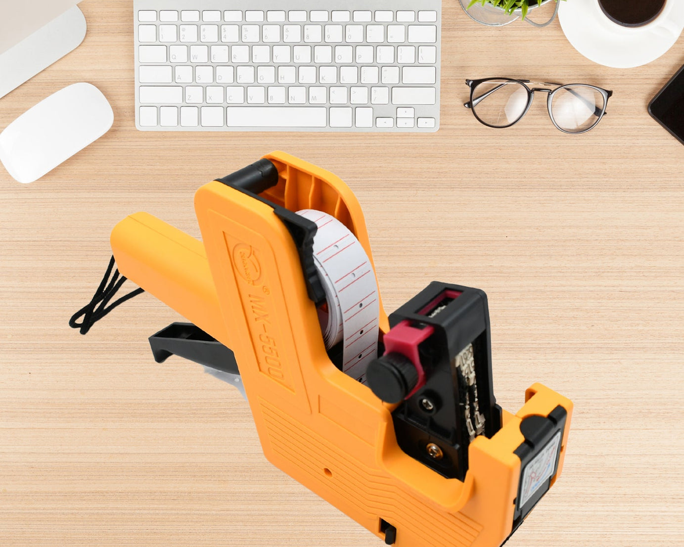 HAND HELD PLASTIC 8 DIGITS PRICE LABEL TAG GUN WIDELY USED IN DEPARTMENTAL STORES AND MARKETS FOR PRICE TAGGING AMONG CUSTOMERS.