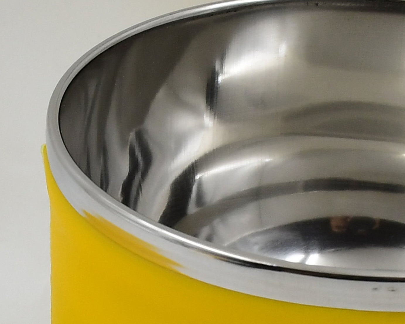 White bowl with a sturdy handle and lid, ideal for serving soups, cereals, and snacks. Dishwasher safe and durable.