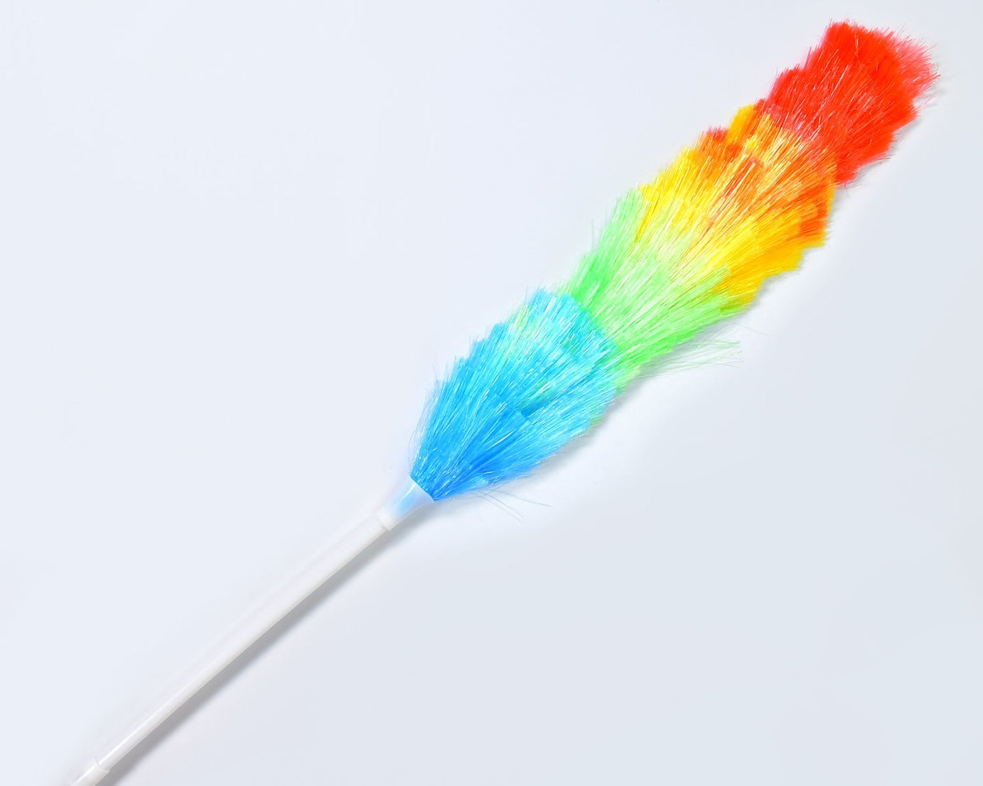 Dusting brush with colorful feathers