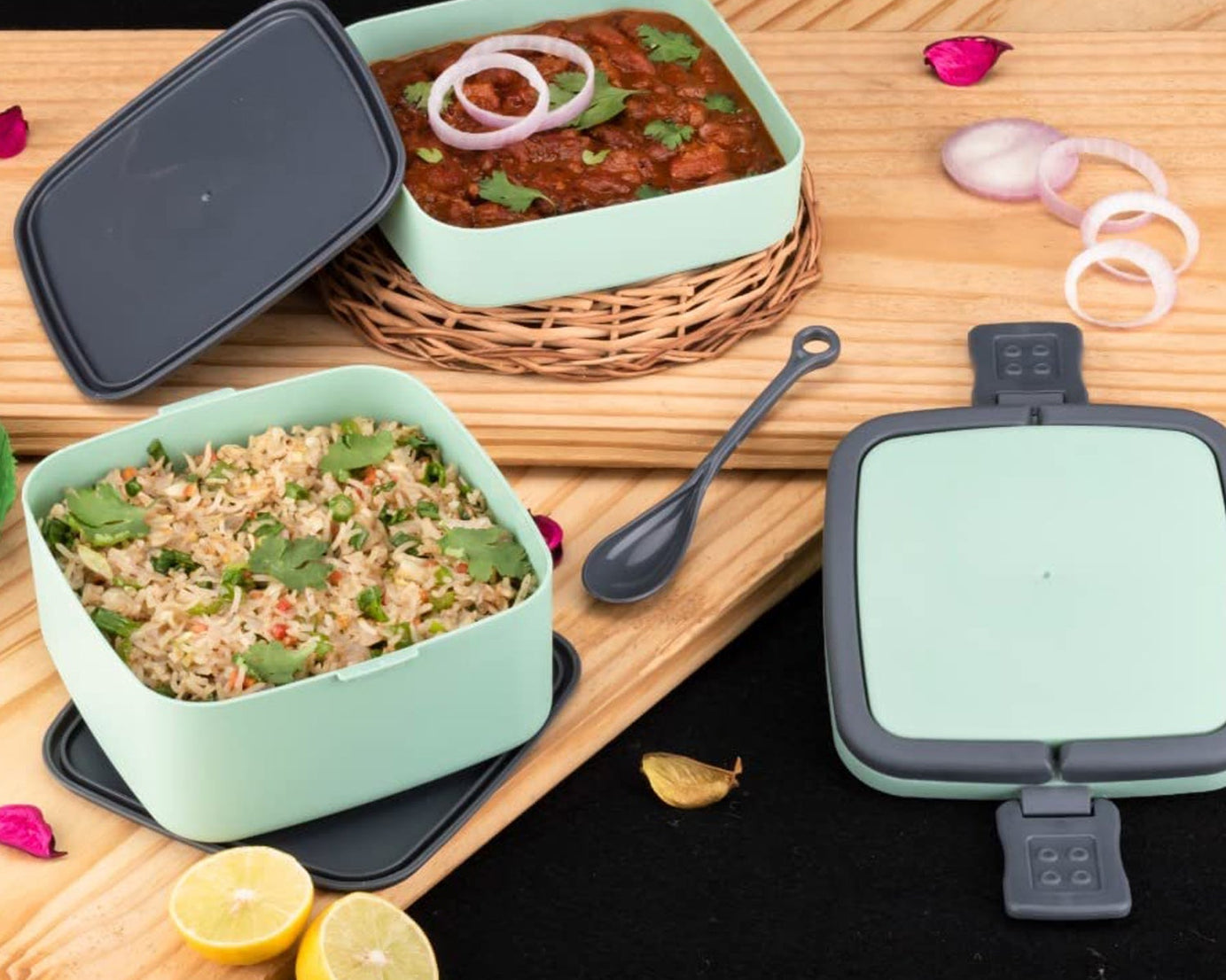 Portable green lunch box with spoon for meals