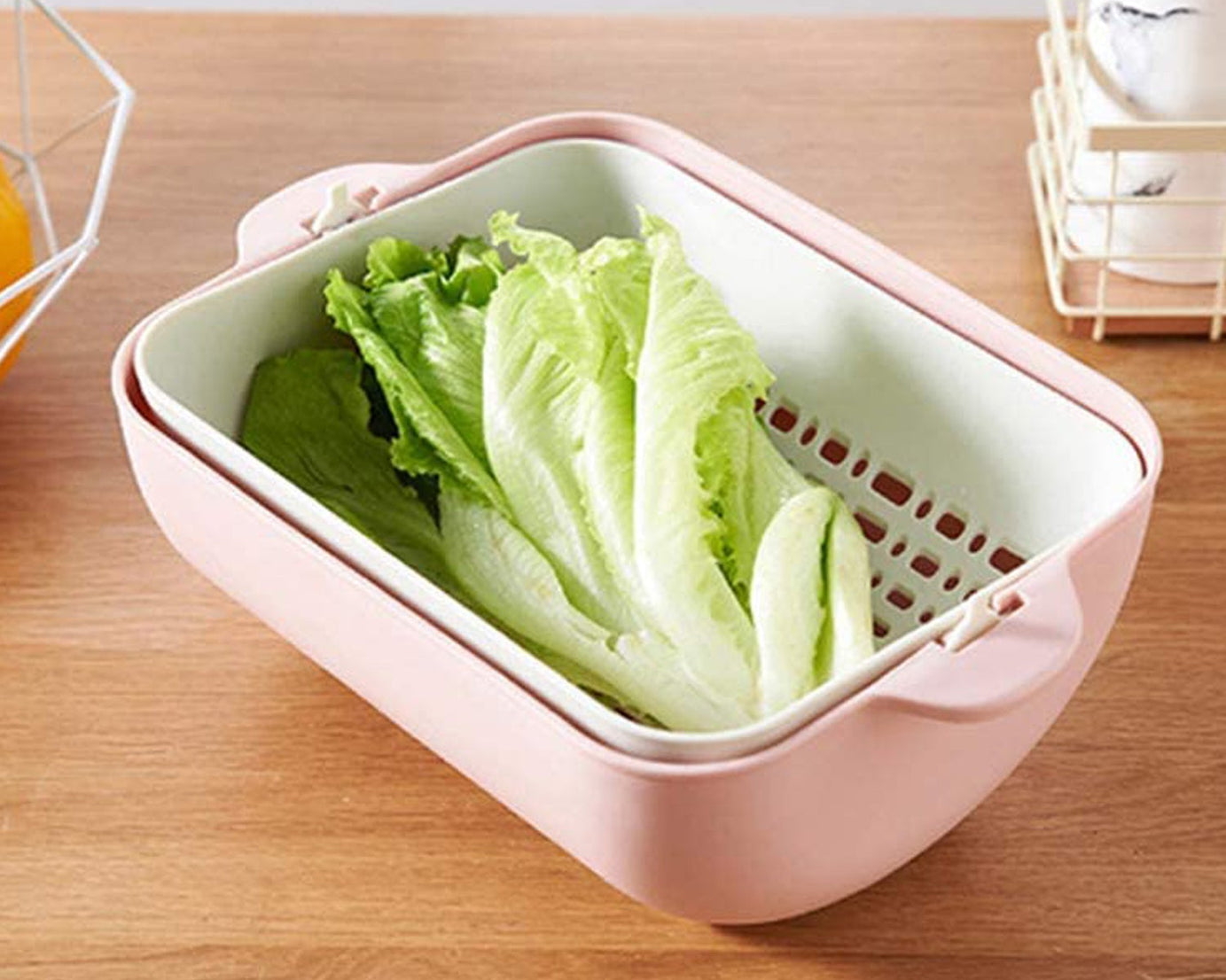 Rotatable strainer bowl with handles, perfect for fruit and veggie washing