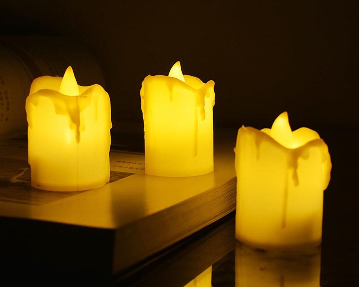 24pc flameless candles with melted design.